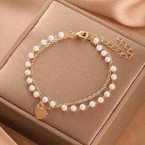 Elegant Gold and White Pearl Bracelet